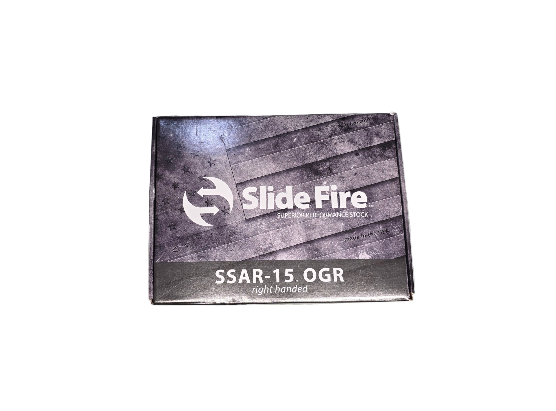 Slide Fire product packaging on a gray surface with a blurred background