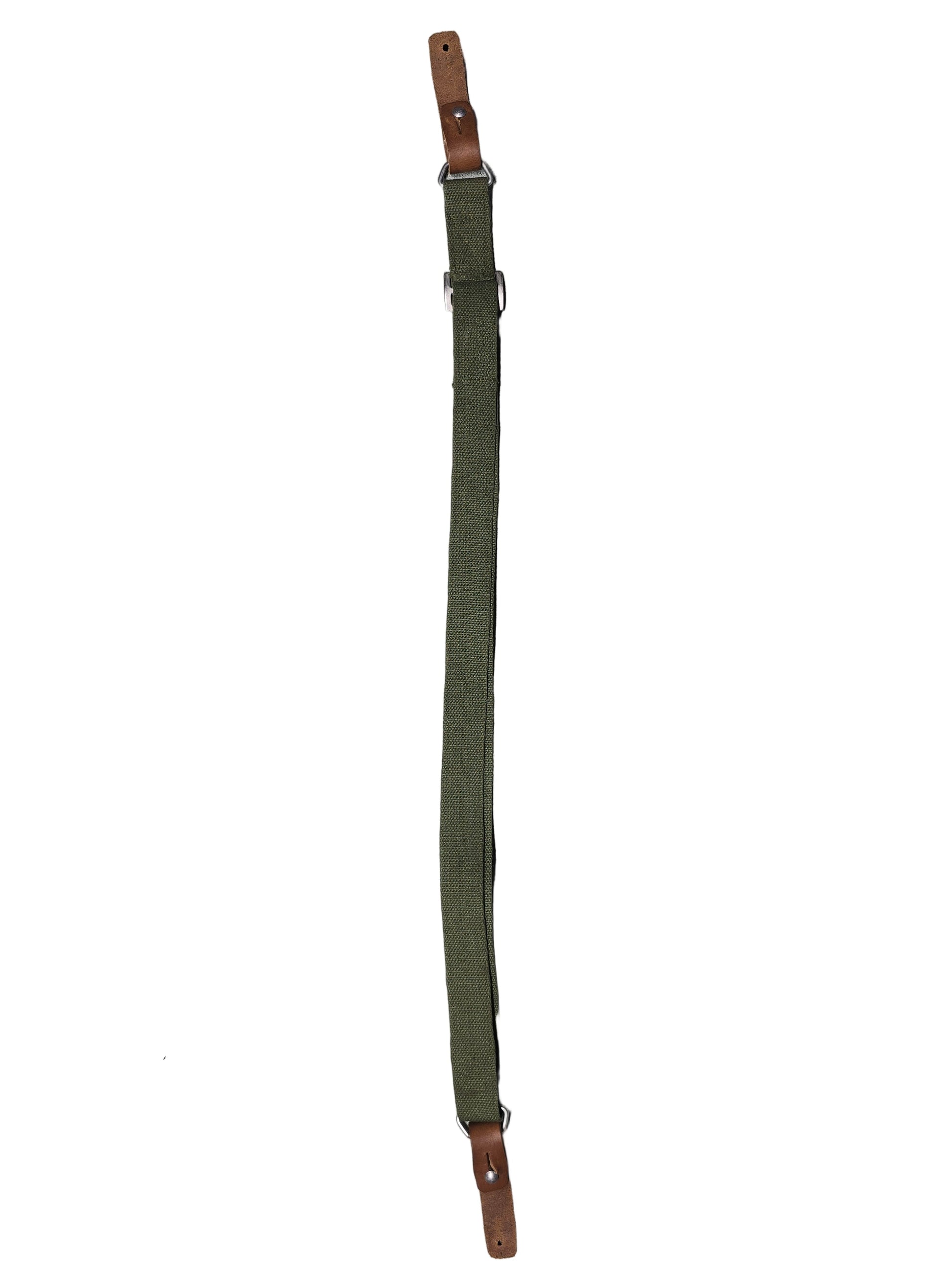 Green sks sling strap with brown leather ends on a gray surface