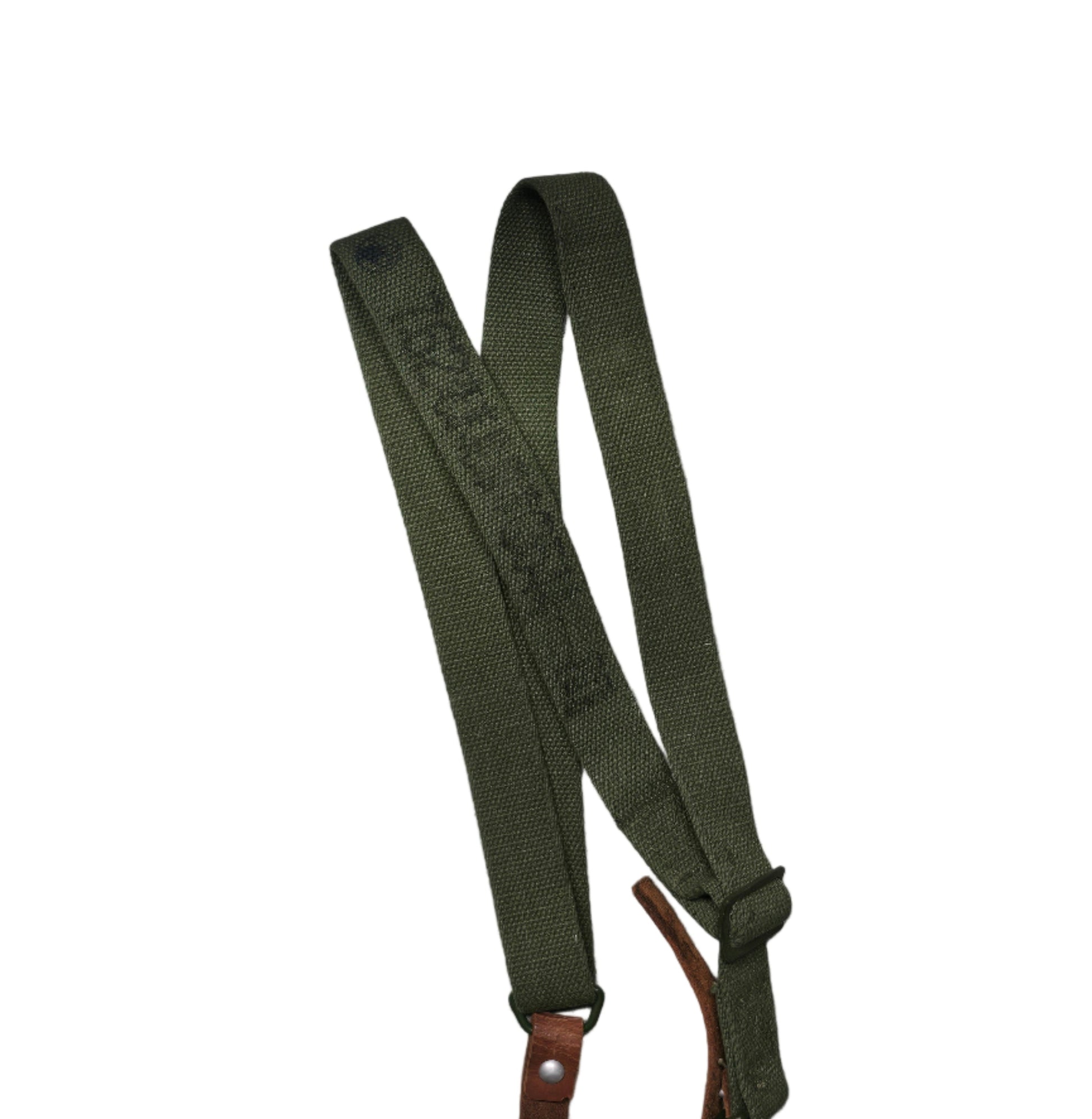 Green strap with brown leather ends on a gray background