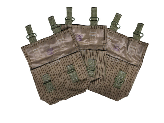 Set of german ww2 tactical pouches with straps on a light gray background