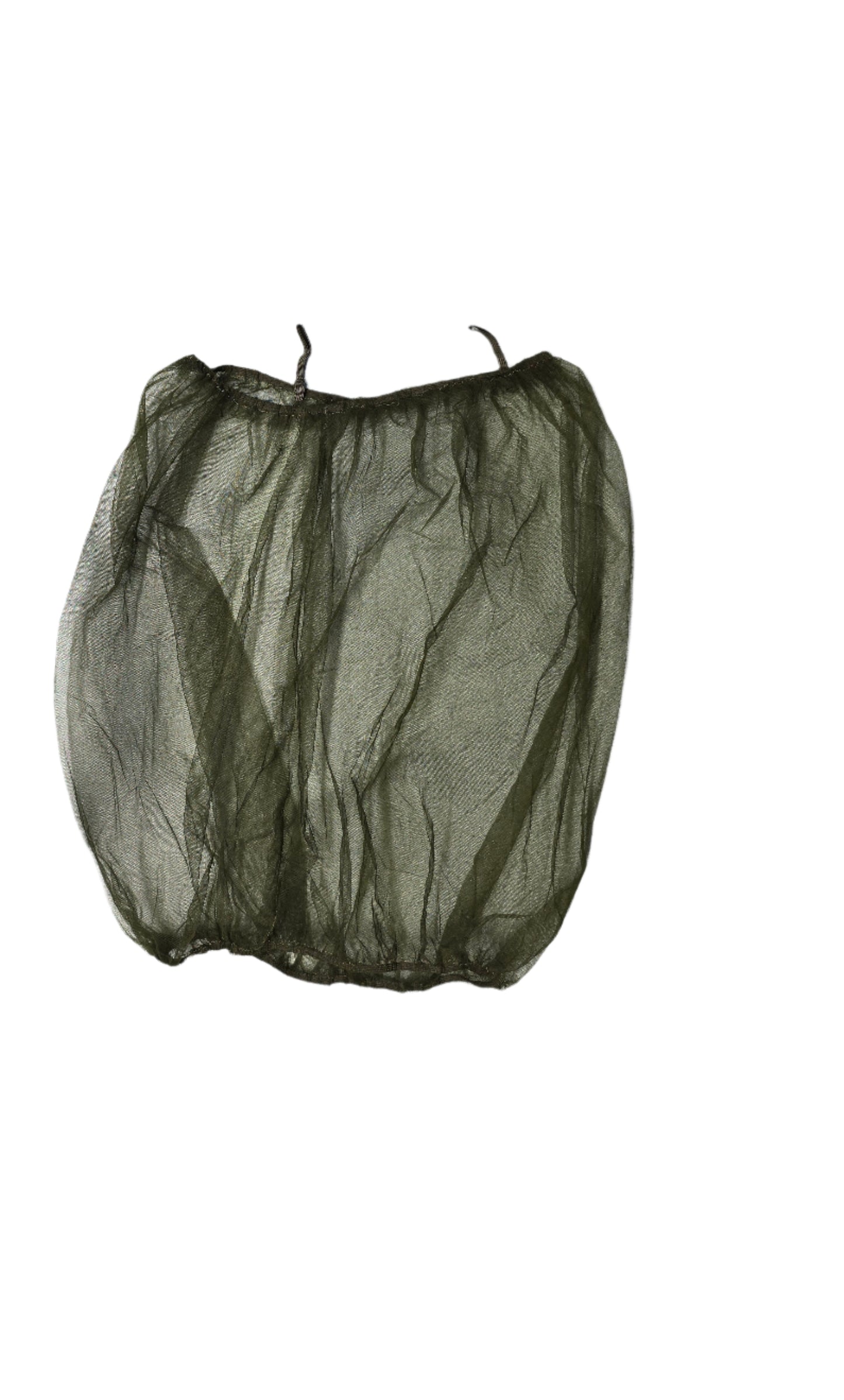 Green mesh bag on a light gray surface with various items in the background