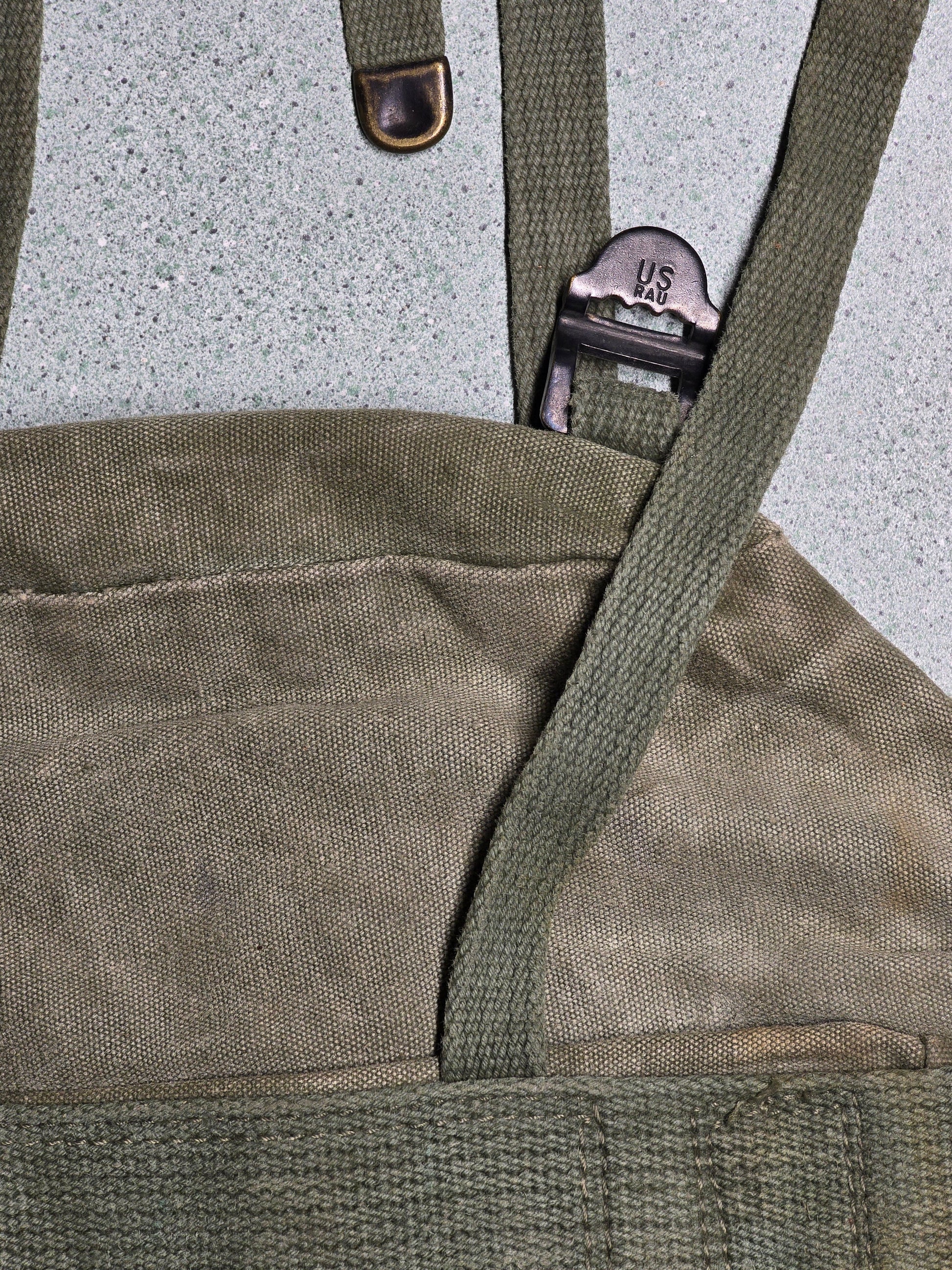U.S. M-1961 Vietnam War "Field Pack Canvas" Bags Vintage military backpack on a gray background