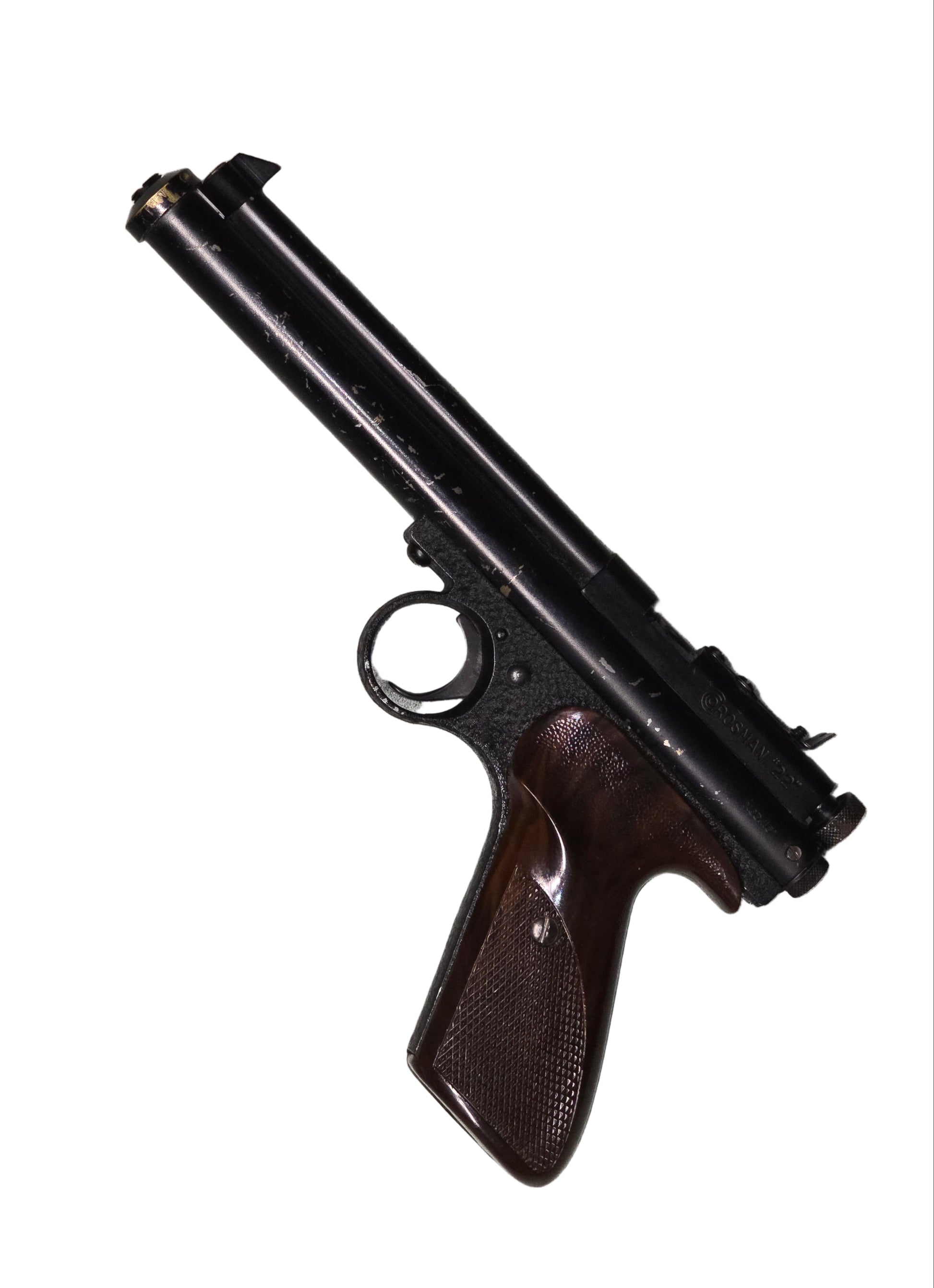 Crossman Model 116 pellet Pistol on a gray surface