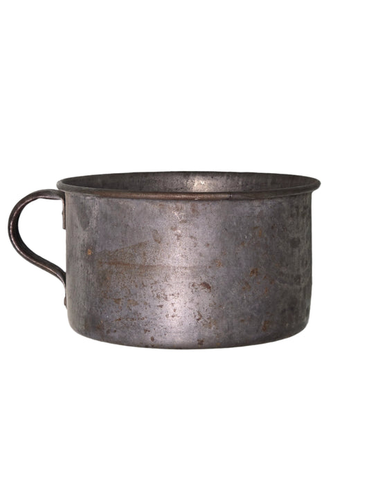 Spanish American war, U.S. tin mug, Metal cup on a gray surface