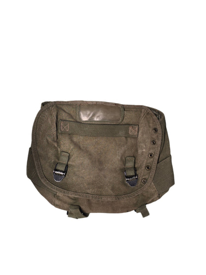 U.S. M-1961 Vietnam War "Field Pack Canvas" Bags Vintage military backpack on a gray background